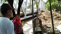 Sungai Banjir Kanal Timur, Semarang, Jawa Tengah, meluap akibat tanggul yang jebol. (Liputan6.com/Edhie Prayitno Ige)
