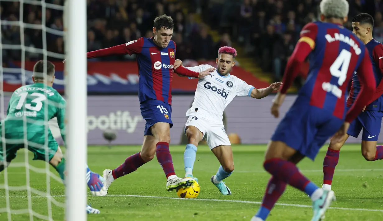 Berkat hasil ini, Girona dengan poin 41 pun berhak mengambil alih puncak klasemen dari tangan Real Madrid. (AP Photo/Joan Monfort)