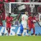 Pemain Kanada,&nbsp;Cyle Larin mengambil bola setelah pemain Maroko, Nayef Aguerd mencetak gol bunuh diri ke gawang timnya saat matchday ketiga Grup F Piala Dunia 2022 yang berlangsung di Al Thumama Stadium, Doha, Kamis (01/12/2022). (AP/Pavel Golovkin)