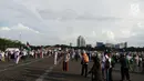 Suasana Aksi Bela Palestina di kawasan silang Monas, Jakarta, Minggu (17/12). Massa dari berbagai daerah ini datang atas ajakan Majelis Ulama Indonesia (MUI). (Liputan6.com)