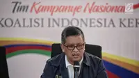 Sekretaris Tim Kampanye Nasional (TKN) Hasto Kristiyanto memberikan keterangan di Posko Cemara, Jakarta, Minggu (30/12). Dalam keteranganya Hasto menjelaskan isu-isu dan refleksi akhir tahun 2018. (Liputan6.com/Faizal Fanani)