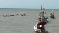 Akibat cuaca  buruk perahu nelayan di Pelabuhan satelet Muncar tenggelam (Istimewa)