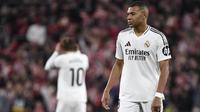 Pemain depan Real Madrid asal Prancis #09, Kylian Mbappe, bereaksi selama pertandingan Liga Spanyol antara Athletic Club Bilbao dan Real Madrid CF di stadion San Mames di Bilbao, Kamis dini hari WIB (5/12/2024). (ANDER GILLENEA/AFP)