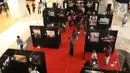 Suasana pameran foto Membangun Indonesia di Mall Neo Soho, Jakarta, Minggu (10/11/2019). Pameran menampilkan foto-foto jurnalistik mengenai pembangunan Indonesia yang dikerjakan Jokowi-JK selama 5 tahun bekerja dan akan berlangsung hingga 17/11. (Liputan6.com/Angga Yuniar)