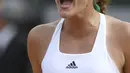Teriakan Kristina Mladenovic saat meraih point melawan petenis Amerika Serikat, Jennifer Brady pada ajang tenis di Roland Garros 2017, Prancis Terbuka, Paris, (31/5/2017). (AFP/Gabriel Bouys)