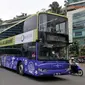 Bus tingkat ini didesain dengan warna mencolok yakni hijau kekuningan dan ungu. Pada bagian depan tertulis 'City Tour Jakarta' (Liputan6.com/JohanTallo).