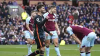 Gelandang Chelsea Christian Pulisic merayakan gol keempat timnya dalam pertandingan Liga Inggris melawan Burnley di Stadion Turf Moor, Burnley, Inggris, Sabtu, 5 Maret 2022. Chelsea menang 4-0. (Martin Rickett/PA via AP)