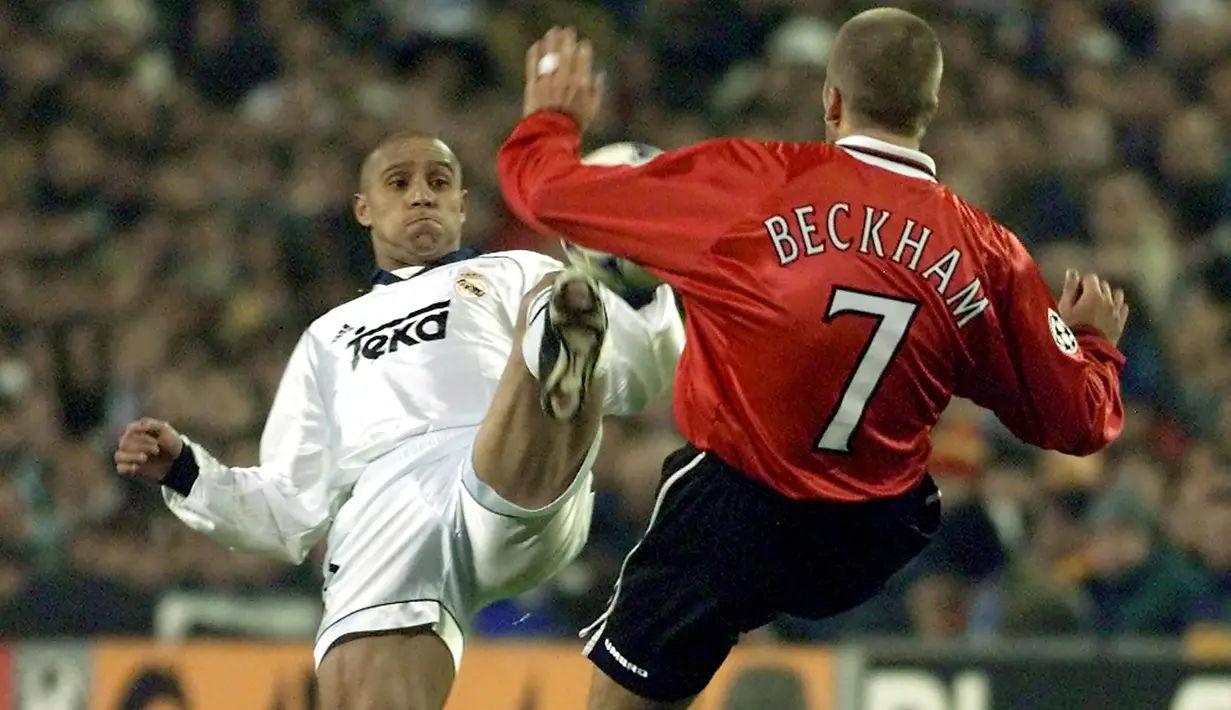 Roberto Carlos. Bek dengan tendangan kaki kiri yang dahsyat ini mampu mencetak 16 gol di Liga Champions bersama Inter Milan, Real Madrid dan Fenerbahce. Total 11 musim dihabiskannya di Real Madrid mulai 1996/1997 hingga 2006/2007. Ia pensiun di Delhi Dynamos pada 2015. (Foto: AFP/Christophe Simon)
