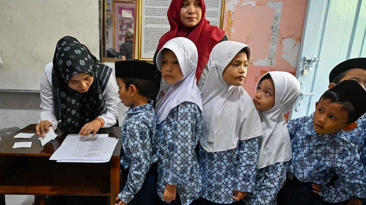 FOTO: Antusias Murid Madrasah Jalani Pemeriksaan Kesehatan Gratis