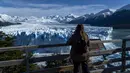 Tebing es ini menjulang di atas Danau Lago Argentino yang berada di Taman Nasional Los Glaciares Patagonia yang telah menjadi Situs Warisan Dunia UNESCO pada tahun 1981. (Walter Diaz / AFP)