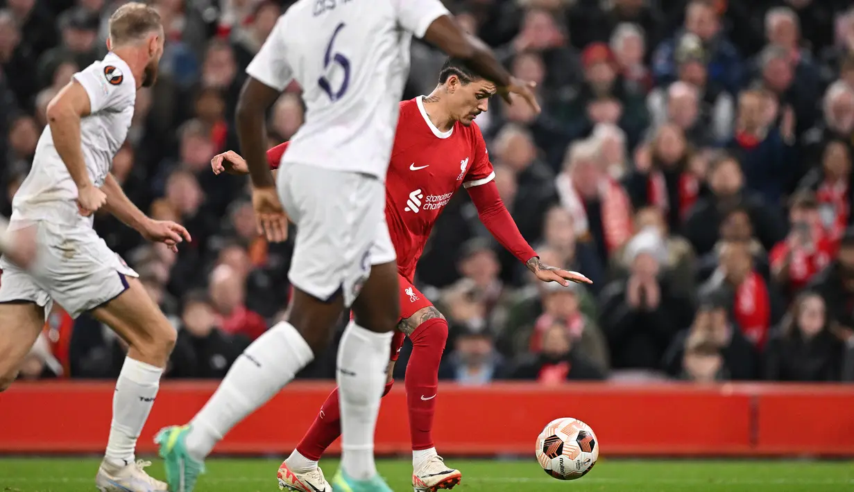 Hasil ini memastikan Liverpool tetap bercokol di puncak klasemen dengan perolehan sembilan poin. (Oli SCARFF / AFP)