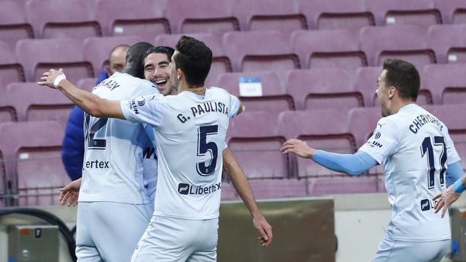 Pemain Valencia pada pertandingan Liga Spanyol (AP Photo/Joan Monfort)