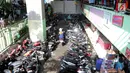 Jejeran motor yang berada di parkiran Blok G Tanah Abang, Jakarta, Jumat (27/4). Pemprov DKI sebelumnya berencana memindahkan para pedagang ke parkiran Blok F. Namun, usulan tersebut ditolak para pedagang. (Liputan6.com/Arya Manggala)