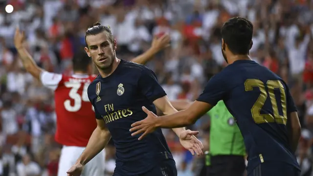Marco Asensio saat memperkuat Real Madrid di arena ICC 2019