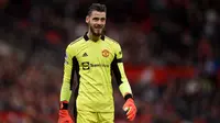 David de Gea merupakan pemain andalan Solskjaer di bawah mistar gawang Manchester United. Ia telah mencatatkan 990 menit bermain dengan mencatatkan dua clean sheet dan 2,9 penyelamatan per laga. (AFP/Oli Scarff)