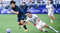 Meski belum jadi pilihan utama, Kota Takai selalu dipanggil pelatih Hajime Moriyasu ke Timnas
Jepang dalam beberapa laga terakhir jika tak mengalami cedera. (AFP/Christophe Archambault)
