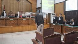 Terdakwa kasus obstruction of justice perkara kematian Nofriansyah Yosua Hutabarat alias Brigadir J, Agus Nurpatria mengikuti sidang vonis di Pegadilan Negeri Jakarta Selatan (PN Jaksel), Senin (27/2/2023). Sebelumnya, jaksa penuntut umum menuntut agar Agus Nurpatria dijatuhi hukuman penjara tiga tahun dan denda sebesar Rp 20 juta subsider 3 bulan kurungan. (Liputan6.com/Angga Yuniar)