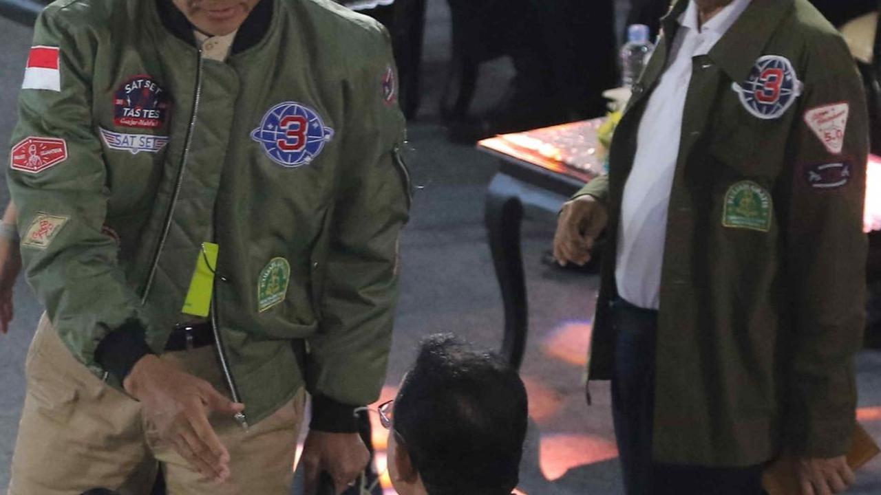 Kemudian pasangan capres-cawapres nomor urut 3, Ganjar Pranowo dan Mahfud MD tiba.<br>Foto Liputan6.com / Angga Yanuar<br>