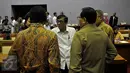 Menkumham Yasonna Laoly (tengah) usai rapat dengan Badan Legislasi DPR di Gedung DPD RI, Jakarta, Senin (28/9/2015).Rapat tersebut membahas RUU JPSK (Jaring Pengaman Sistem Keuangan). (Liputan6.com/Johan Tallo)