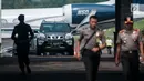 Kendaraan yang membawa rombongan Barack Obama keluar dari Bandara Halim Perdana Kusuma, Jakarta, Jumat (30/6). Kedatangan Barack Obama ke Jakarta merupakan salah satu rangkaian acara selama mengunjungi Indonesia. (Liputan6.com/Gempur M Surya)