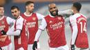 Striker Arsenal, Alexandre Lacazette melakukan selebrasi usai mencetak gol ketiga timnya ke gawang West Bromwich Albion dalam laga lanjutan Liga Inggris 2020/21 pekan ke-17 di Hawthorns Stadium, Sabtu (2/1/2021). Arsenal menang 4-0 atas West Bromwich Albion. (AFP/Michael Regan/Pool)