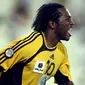 Former Aston Villa player Eric Djemba-Djemba of Cameroon now playing at Qatar club celebrates after scoring the goal against al-Wakra club during their Qatari championship football match in Doha 10 September 2007. AFP PHOTO/KARIM JAAFAR