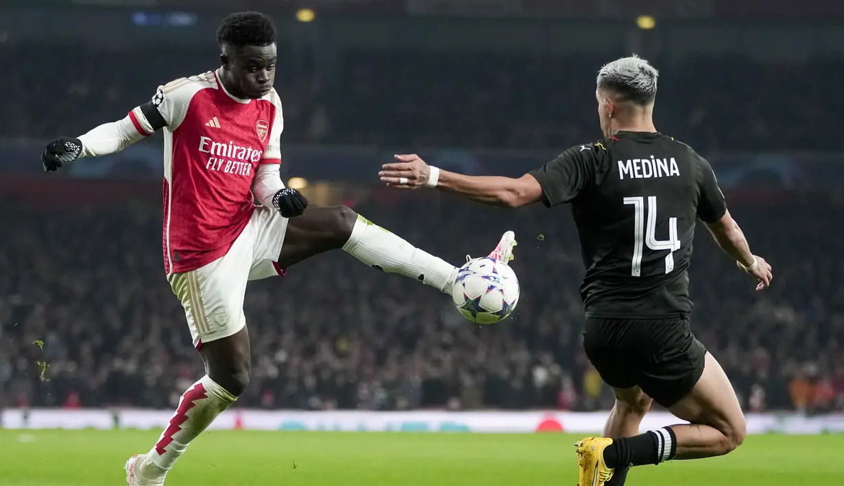Arsenal melibas habis tamunya, Lens dengan skor telak 6-0. (AP Photo/Kin Cheung)