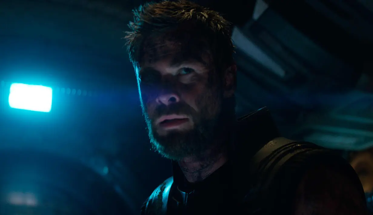 Aktor Chris Hemsworth saat beradegan dalam film Avengers Infinity War. Chris Hemsworth berperan sebagai Thor di film tersebut. (Marvel Studios via AP)