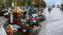 Hingga Minggu (17/3/2024), sejumlah nelayan di kawasan Pelabuhan Karangantu Serang, Banten masih enggan melaut. (Liputan6.com/Angga Yuniar)