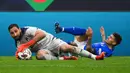 Gianluigi Donnarumma. Ia hanya mampu membawa Italia menempati posisi kedua Grup C di bawah Swiss dan harus memainkan laga play-off. Jika lolos, Piala Dunia 2022 merupakan Piala Dunia pertamanya. (AFP/Franck Fife)