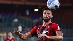 Rekrutan anyar AC Milan, Olivier Giroud juga berhasil tampil impresif pada laga debutnya di Rossoneri. Pelatih Stefano Pioli langsung mempercayakan Giroud sebagai starter di laga tersebut. (Foto: AFP/Miguel Medina)