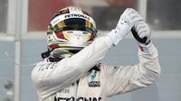 Ekspresi Lewis Hamilton setelah finis. (photo by AFP/FAYEZ NURELDINE)