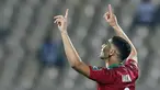 Bek Maroko Achraf Hakimi berselebrasi setelah mencetak gol kedua timnya ke gawang Malawi pada babak 16 besar Piala Afrika 2021 di Ahmadou Ahidjo Stadium, Yaounde, Rabu (26/1/2022) dini hari WIB. Achraf Hakimi menjadi penentu kemenangan Maroko atas Malawi, 2-1. (Kenzo Tribouillard/AFP)