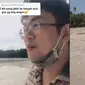 Fenomena pantai kering bikin pria ini nekat jalan ke tengah laut. (TikTok/@ciloksma9)