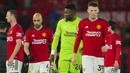 Ekspresi kecewa para pemain Manchester United setelah menelan kekalahan 0-3 dari Bournemouth pada laga pekan ke-16 Liga Inggris 2023/2024 di Old Trafford Stadium, Sabtu (9/12/2023). (AP Photo/Jon Super)