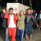 Sekitar 100 orang menyaksikan saat jenazah Sumarti tiba di kampung halamannya di Dusun Kebanaran, Cilacap, Jawa Tengah.