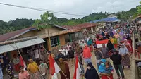 Warga Desa Sambiki, Kecamatan Obi, saat menggelar deklarasi menolak kehadiran perusahaan PT Amazing Tabara di kawasan konsesi IUP yang diduga mencaplok wilayah mereka. (Liputan6.com/Hairil Hiar)