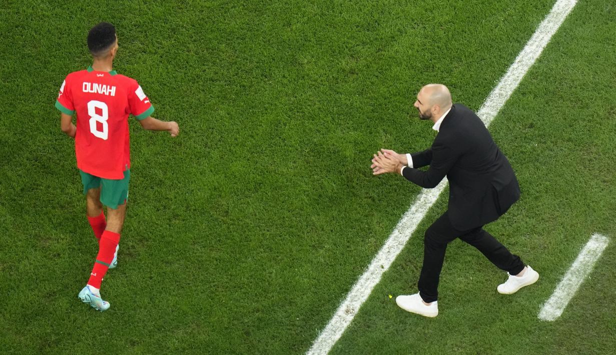 Walid Regragui memulai karier kepelatihannya pada tahun 2014. Ia baru tiga kali menangani klub yaitu di FUS Rabat Maroko pada 2014-2019, Al Duhail Qatar pada 2020, dan Wydad SC Maroko pada 2021-2022. (AP/Petr David Josek)