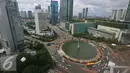 Suasana gedung bertingkat di kawasan Bundaran HI, Jakarta, Rabu (21/12). Tahun 2016 akan berakhir, tetapi penerimaan pajak sepanjang Januari-November ini baru mencapai 71 persen dari target Rp 1.355,2 triliun di APBNP 2016. (Liputan6.com/Angga Yuniar)