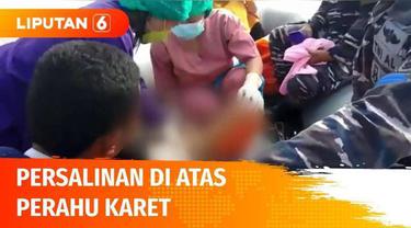 Air ketuban pecah saat dalam perjalanan menyeberangi Sungai Kapuas, seorang korban banjir terpaksa melahirkan di atas perahu karet.