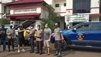 Polisi di Lingkungan Polsek Pondok Aren Terima Paket Sembako dari Komunitas Moge Jelang Ramadan. (Istimewa)