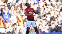 Penyerang Manchester United (MU) Anthony Martial merayakan gol ke gawang Chelsea pada lanjutan Liga Inggris di Stamford Bridge, Sabtu (20/10/2018). (AFP/Glyn Kirk)