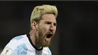 Selebrasi Lionel Messi setelah mencetak gol ke gawang Uruguay, Jumat (2/9/2016). (AFP)