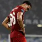 Bek kanan Liverpool, Trent Alexander-Arnold bereaksi setelah matchday pertama Grup E Liga Champions melawan Napoli di Stadion San Paolo, Selasa (17/9/2019). Juara bertahan Liverpool secara mengejutkan menyerah dua gol tanpa balas dari tuan rumah Napoli. (AP Photo/Gregorio Borgia)