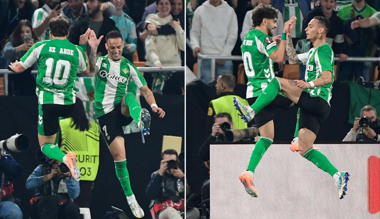 Pemain Real Betis, Antony dan Abde Ezzalzouli, melakukan selebrasi setelah mencetak gol ke gawang Lyon pada laga Liga Europa di Estadio La Cartuja, Jumat (7/11/2025) dini hari WIB. (AFP/Cristina Quicler)