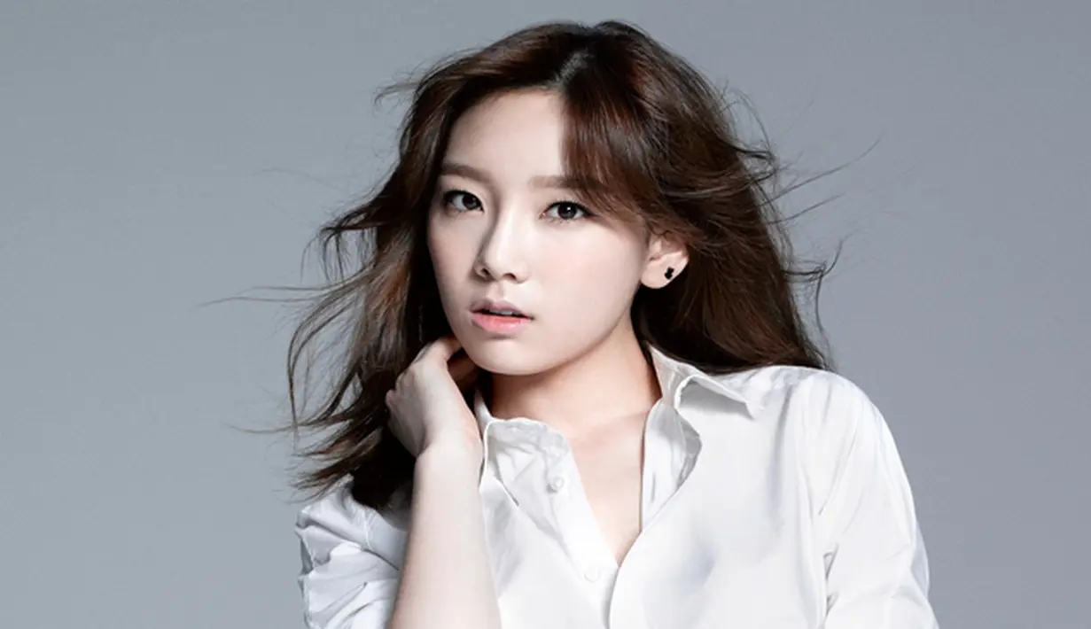 Taeyeon dipaksa meminta maaf di depan publik karena berhubungan dengan Baekhyun. Taeyeon merasa tertekan dengan perilaku anti-fans Baekhyun. (Soompi/Bintang.com) 