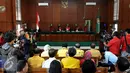 Suasana saat sidang putusan sengketa dualisme partai Golkar di PN Jakarta Utara, Jumat, (24/7/2015). Hakim Lilik Mulyadi memutuskan, keabsahan kepengurusan Partai Golkar kubu Munas Bali. (Liputan6.com/Johan Tallo)