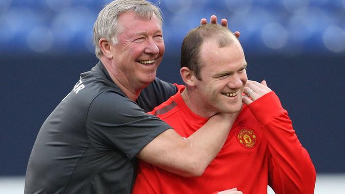 Sir Alex Ferguson (kiri) dan Wayne Rooney (kanan) saat masih berkarier di Manchester United.