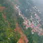 Penampakan banjir dan longsor dari udara di Desa Pasir Madang, Kecamatan Sukajaya, Kabupaten Bogor pada Jumat (4/1/2020). (Dok Badan Nasional Penanggulangan Bencana/BNPB)