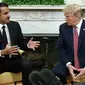 Emir Qatar Sheikh Tamim bin Hamad Al Thani dan Presiden Amerika Serikat Donald Trump (AP Photo/Evan Vucci)